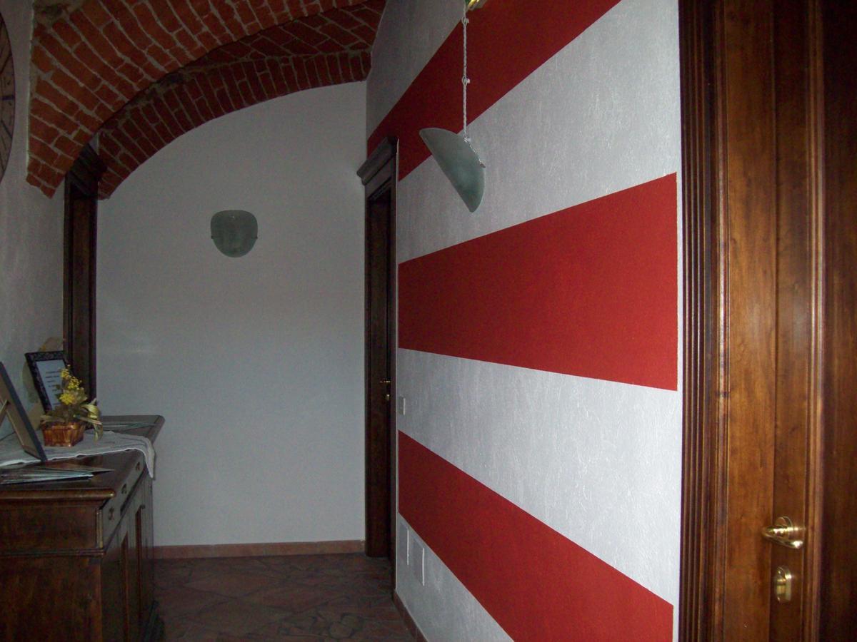 Hotel Excalibur Revello Buitenkant foto